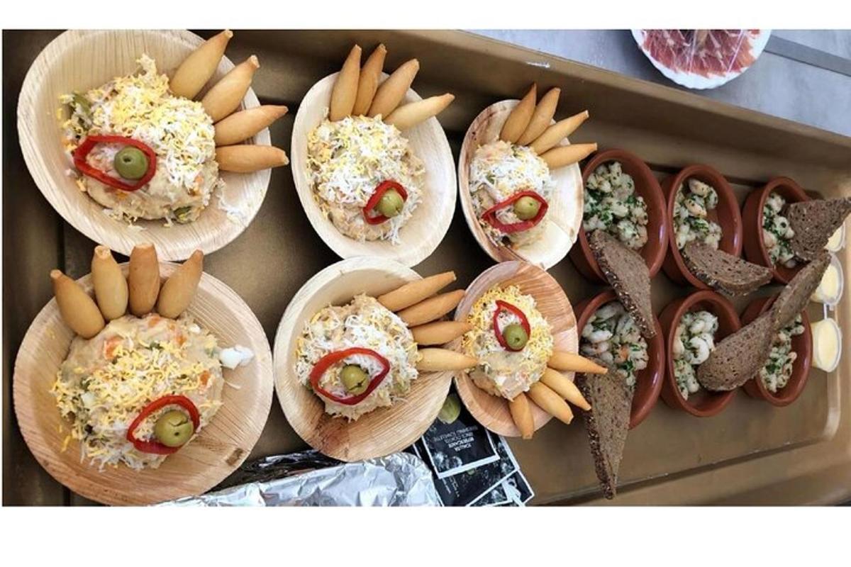 a bunch of hot dogs and french fries on plates