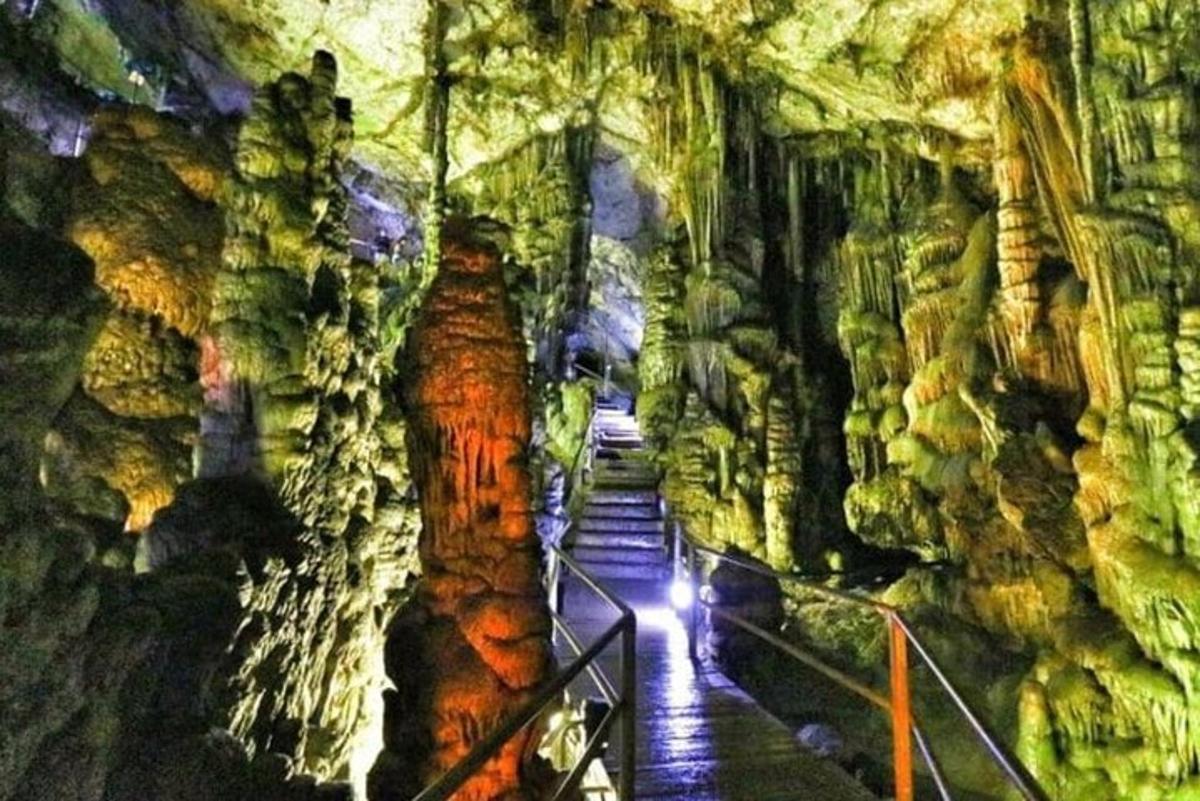 a tour of a cave with stairs in it
