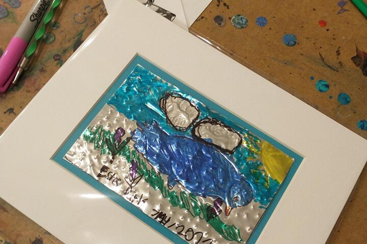 a painting of a fish on a table