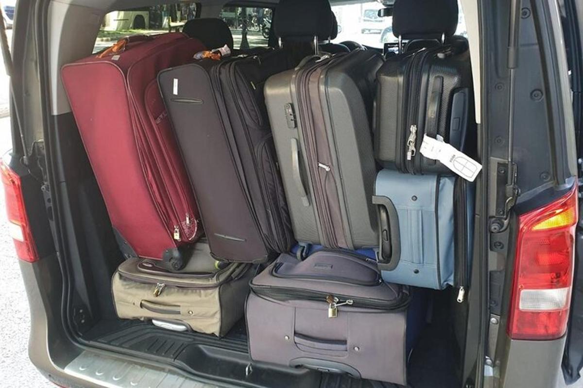 a van filled with lots of luggage in the back