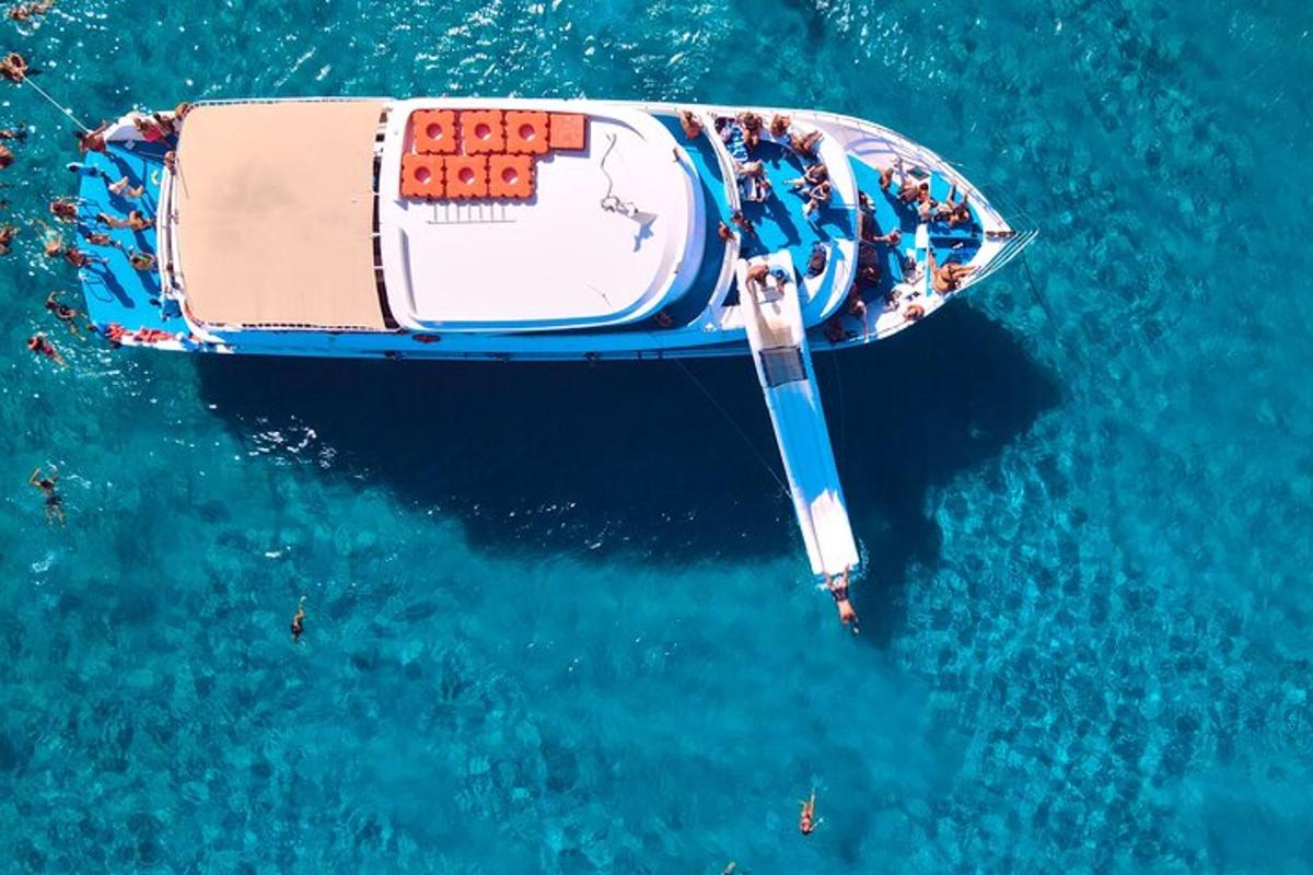 a group of people on a boat in the water
