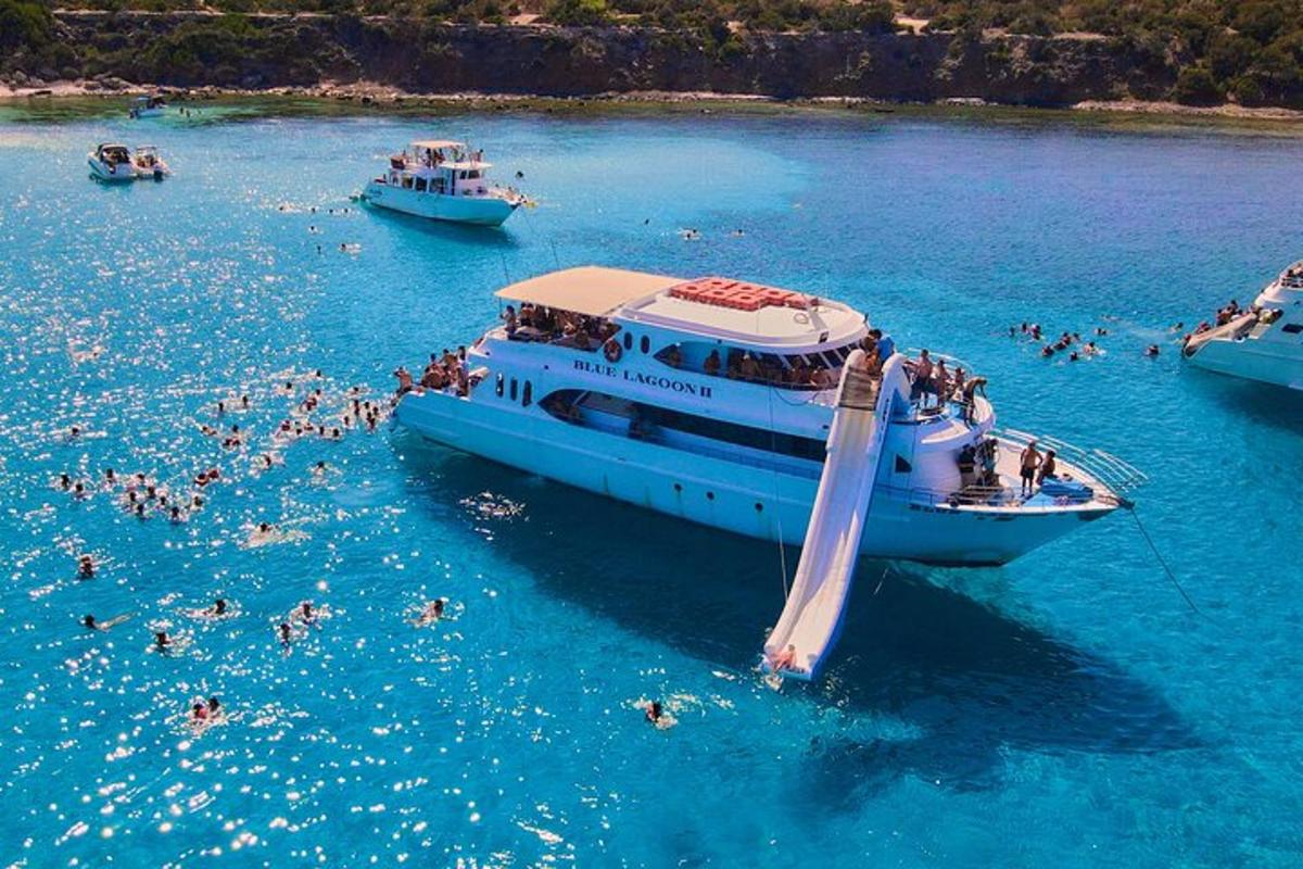 a group of people on a boat in the water