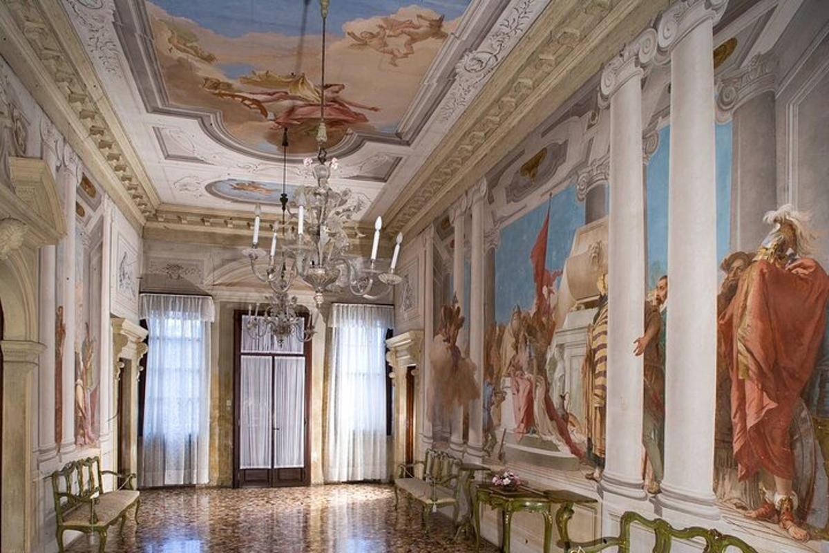 a large room with paintings on the walls