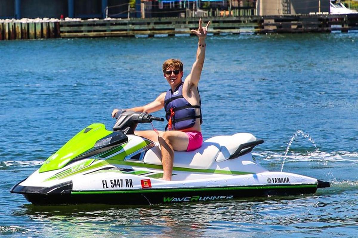 a man riding a jet ski on the water