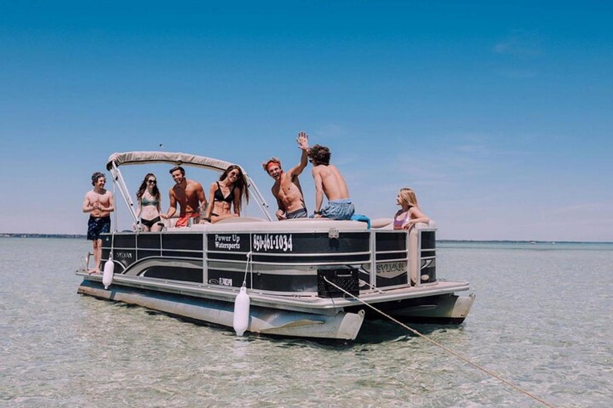 a group of people on a boat in the water