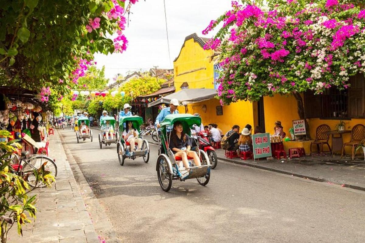 a group of people riding in carts down a street