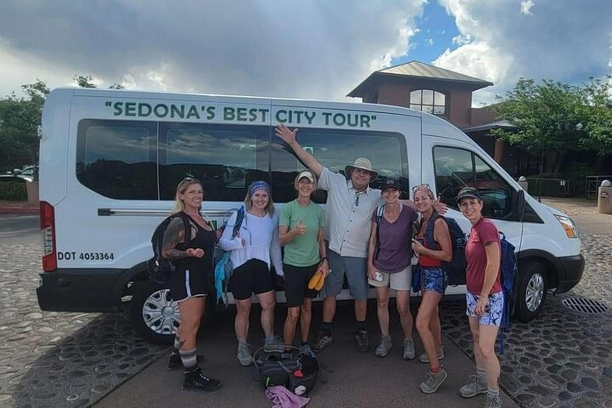 a group of people standing in front of a van