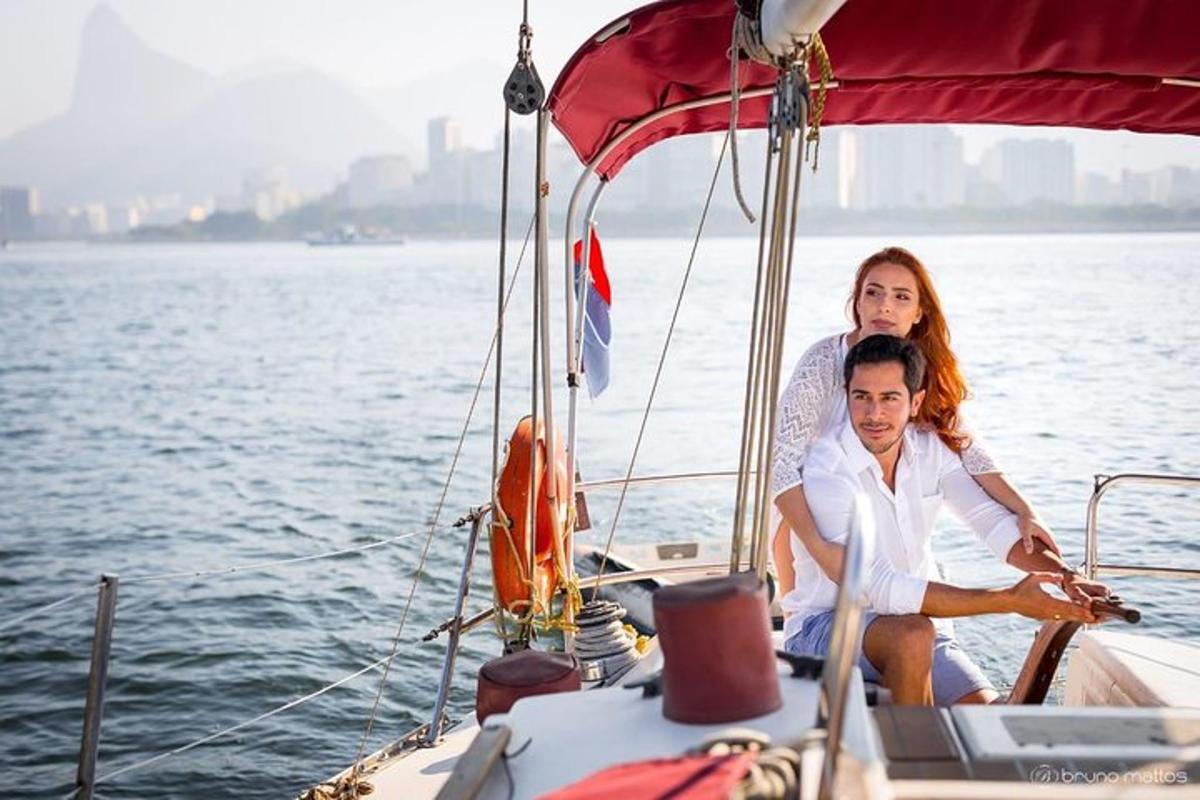 a man and woman sitting on a boat in the water