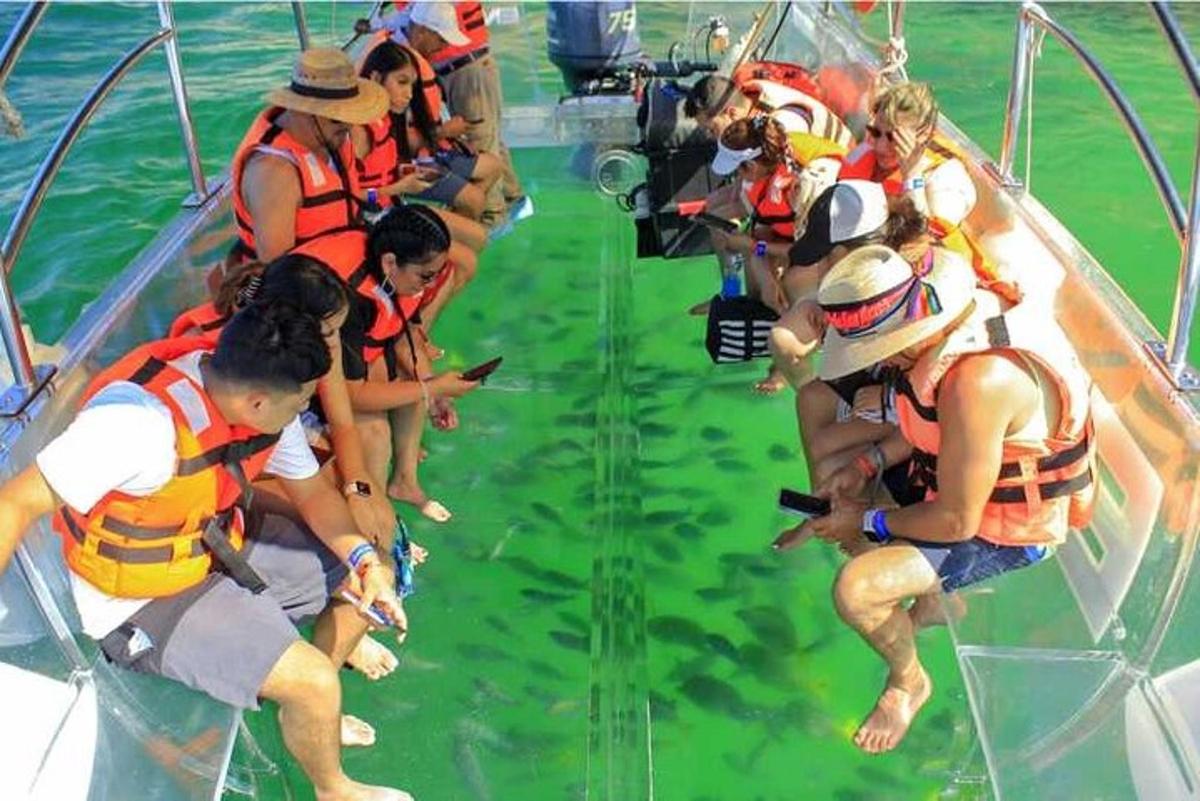a group of people on a boat in the water