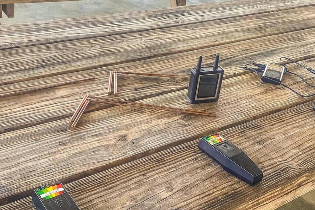 a group of electronic devices on a wooden floor
