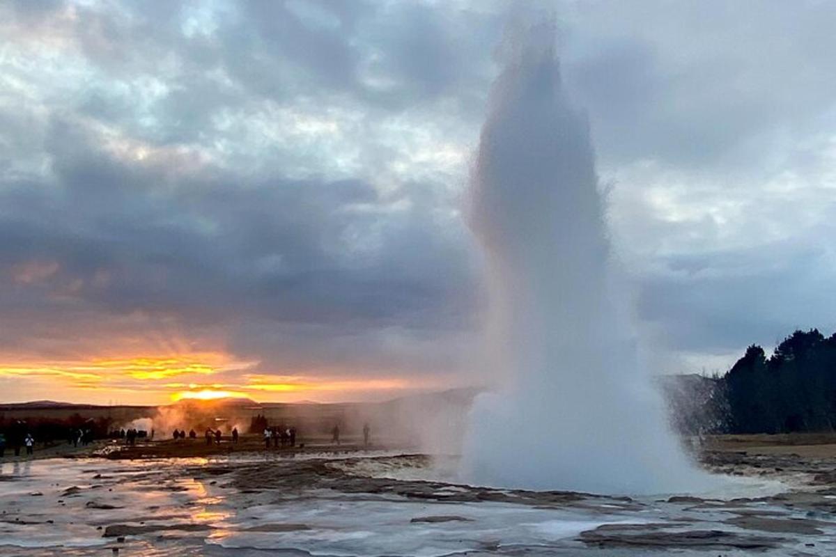 a geyser in the middle of a body of water