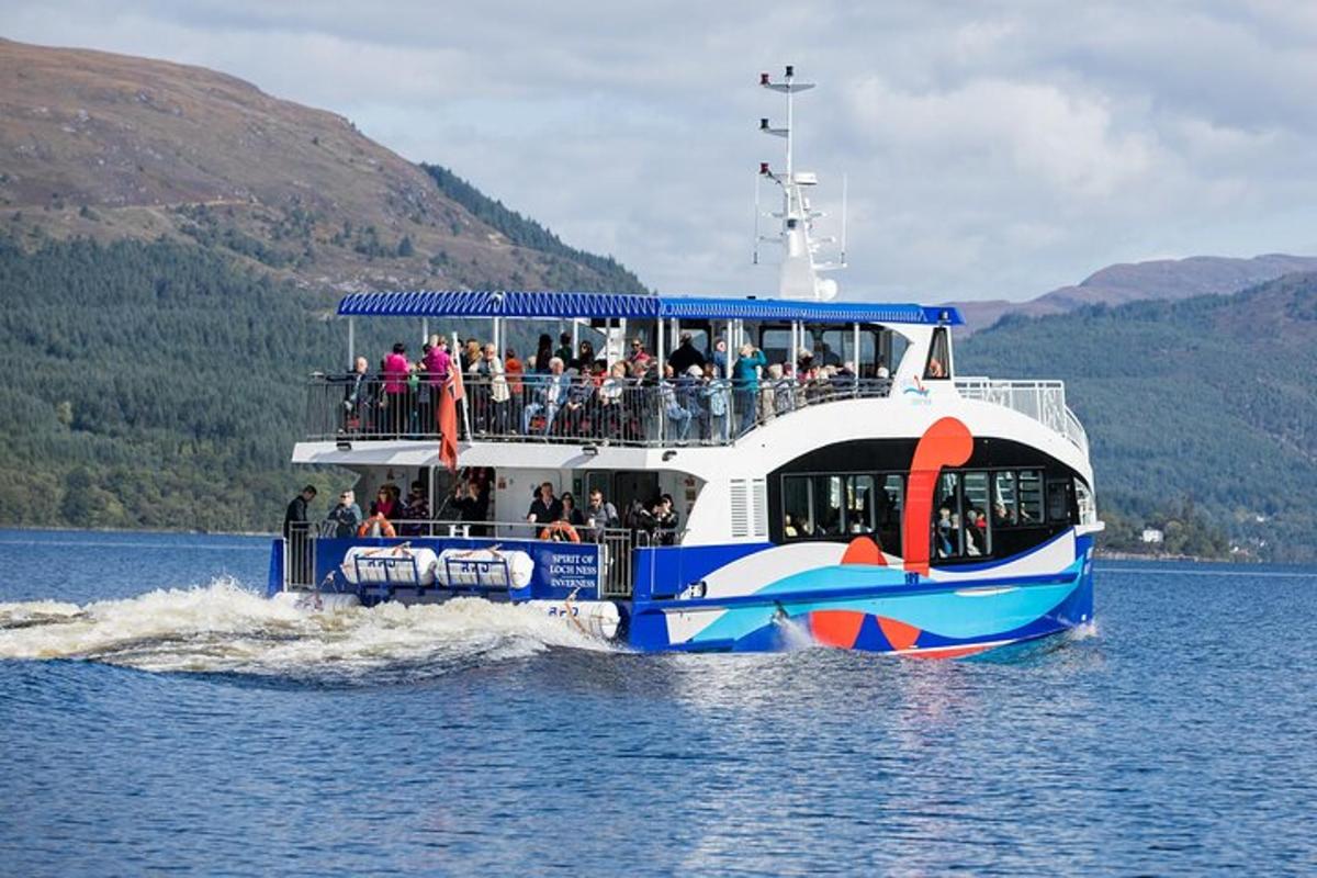 a ferry boat filled with people on the water
