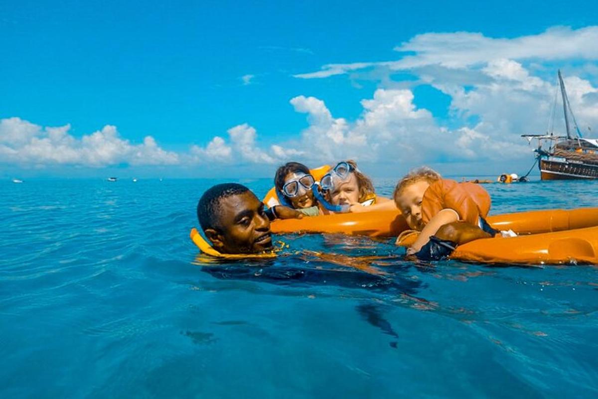 a group of children on a raft in the water