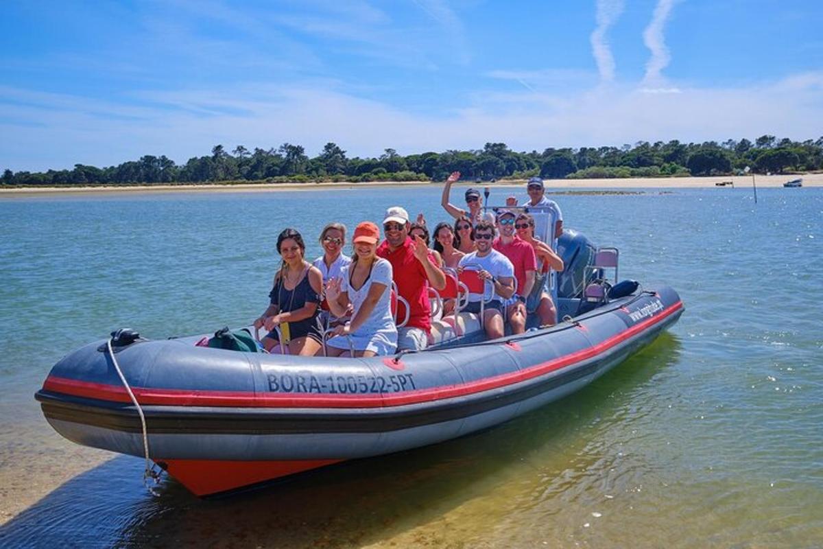 a group of people sitting in a boat on the water