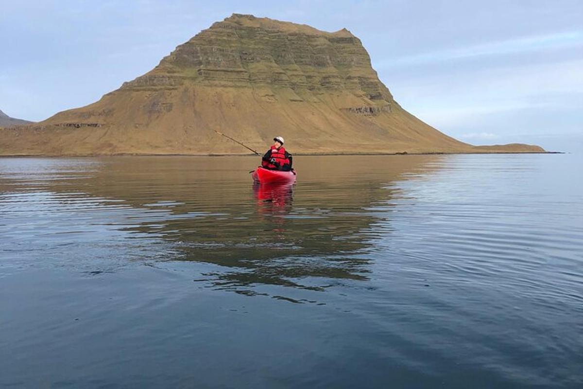 a person in a kayak in a body of water