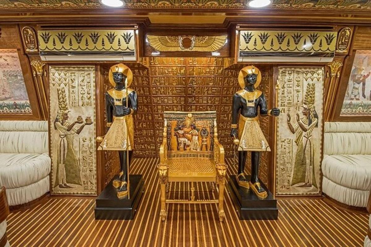 a room with two mannequins on a ship