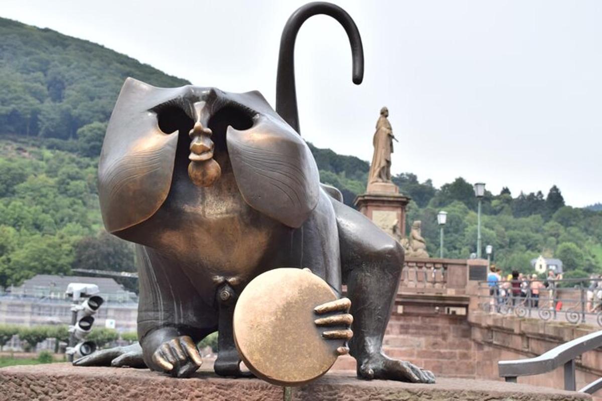 a statue of a bear holding a skateboard