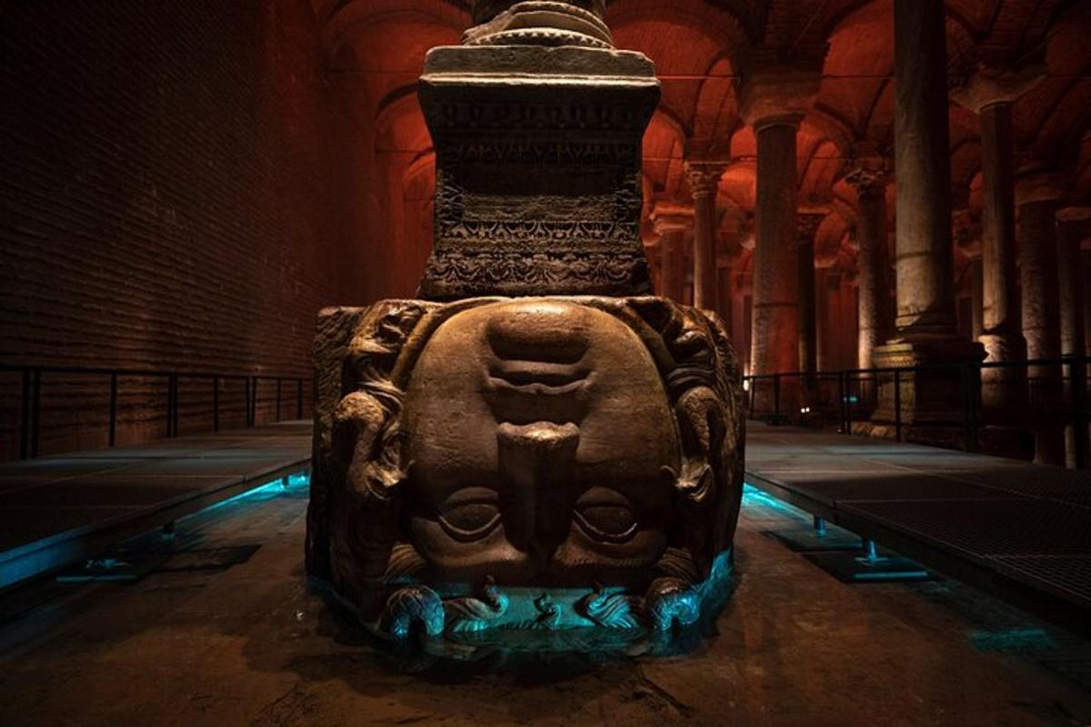 a stone statue in a large room in a building