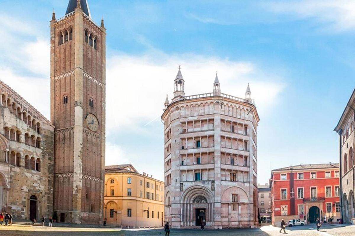 a tall clock tower next to a building