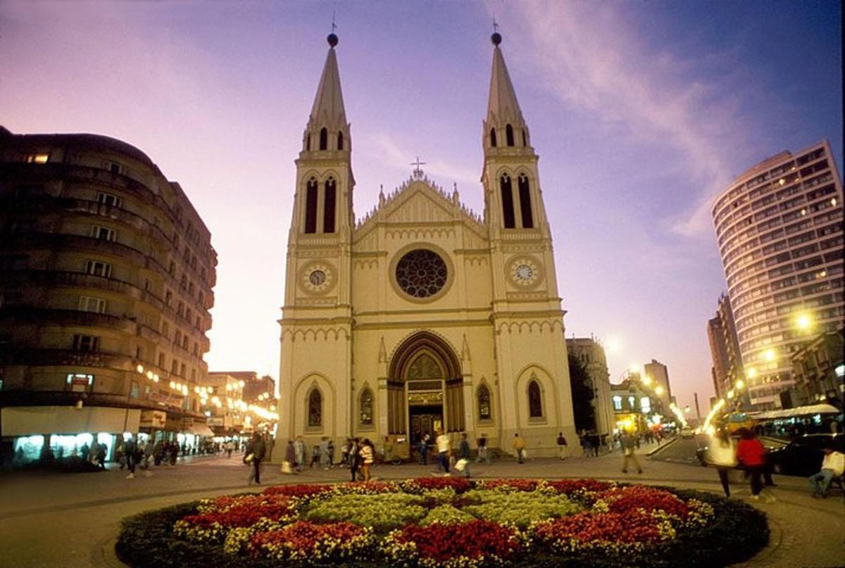 a church with two towers in a city