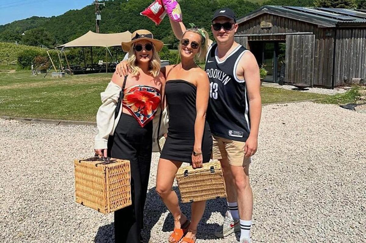 a group of three people posing for a picture