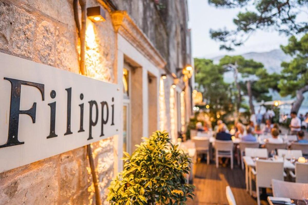 a restaurant with a sign on the side of a building