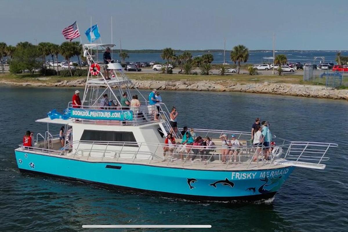 a group of people on a ferry boat in the water