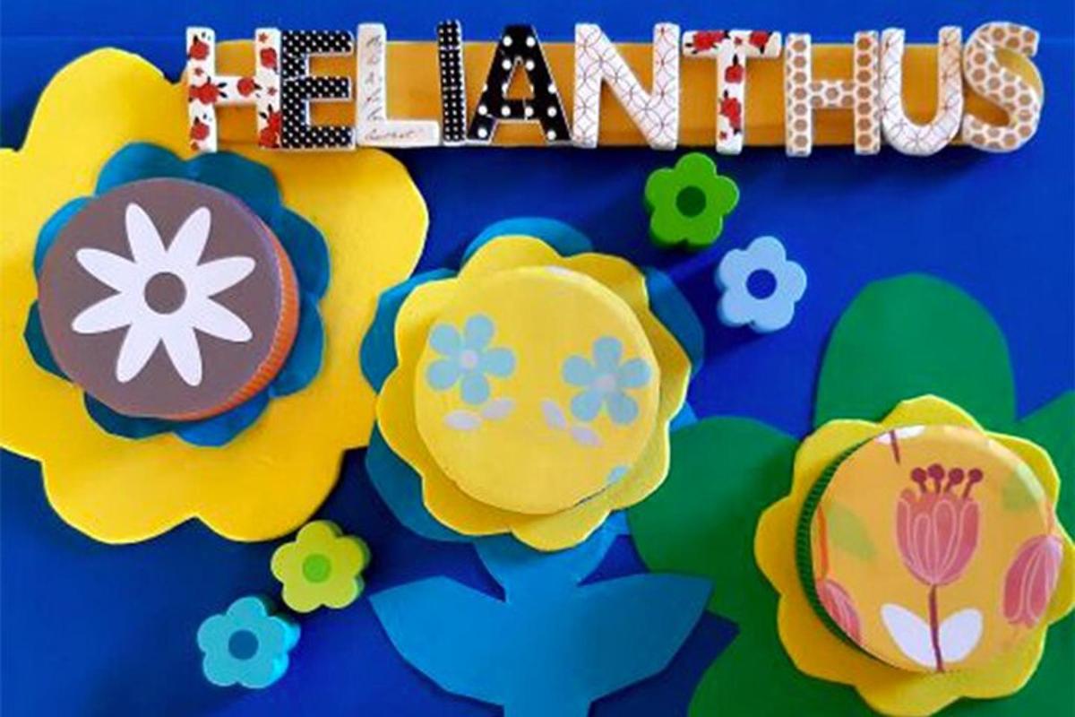 a bulletin board with flowers and the word learning
