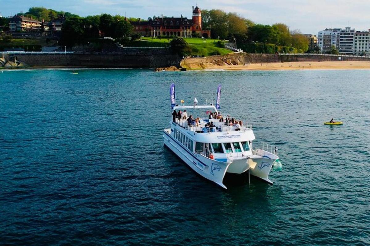 a boat in the water with a group of people on it