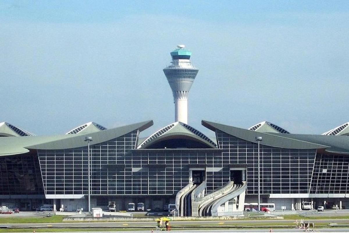 an airport with a control tower on top of a building