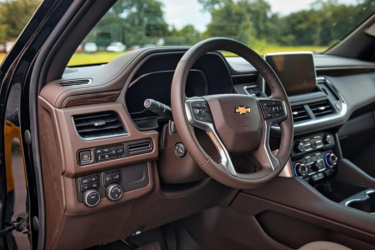 a dashboard of a car with a steering wheel