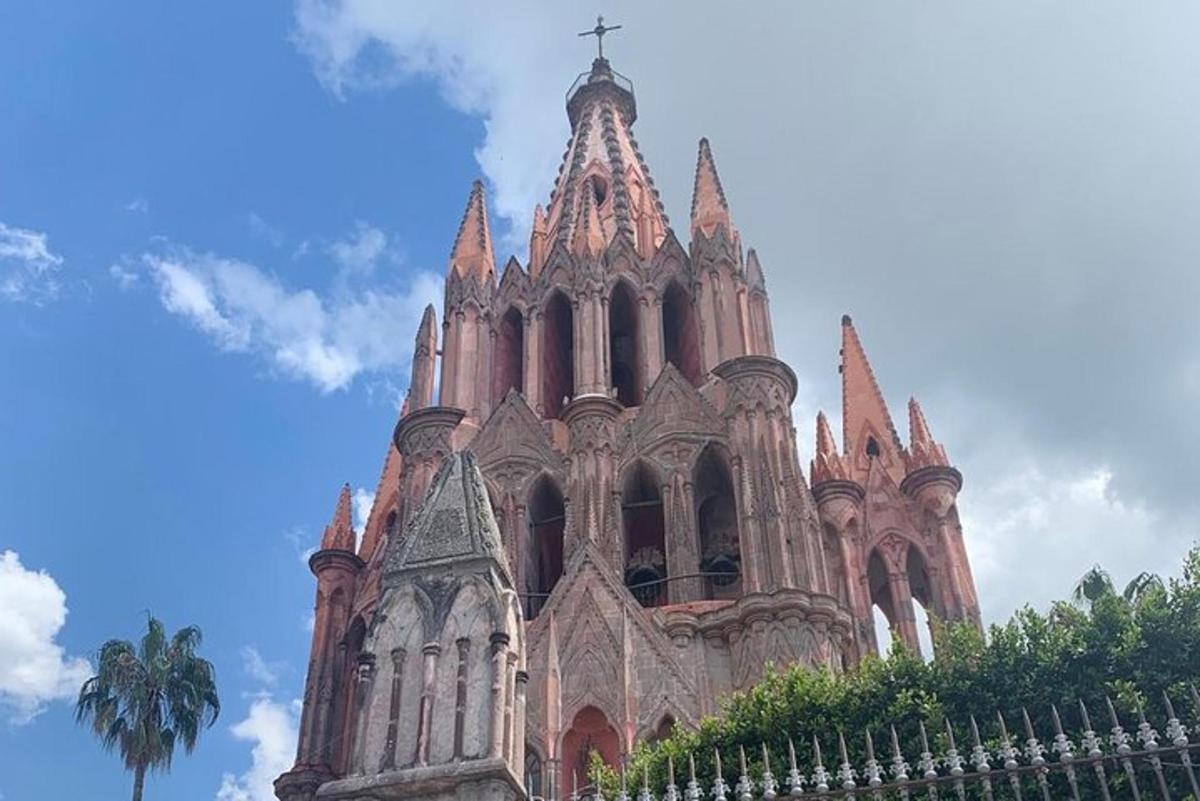 a church steeple with a cross on top of it