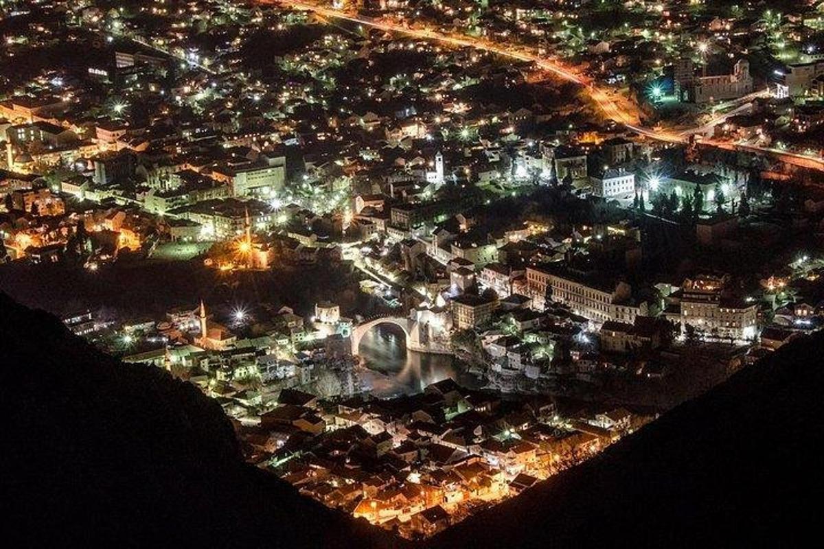 an aerial view of a city at night