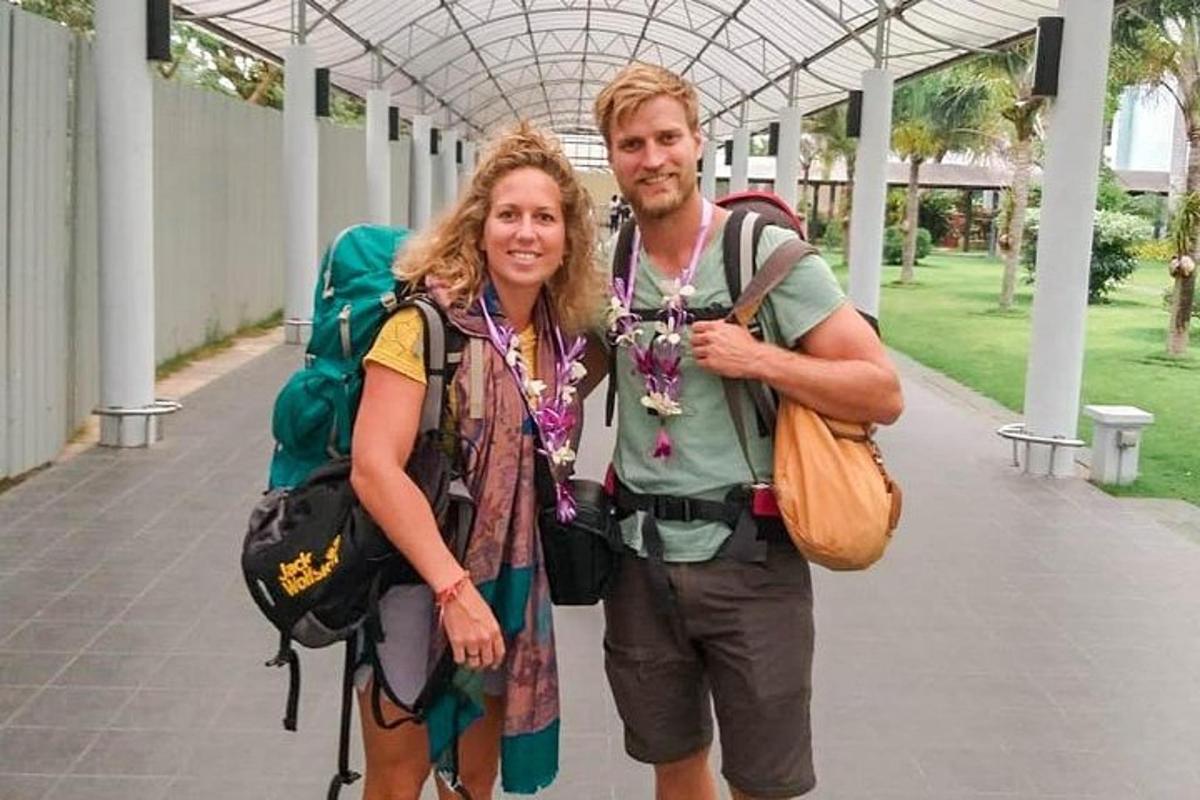 a man and a woman posing for a picture