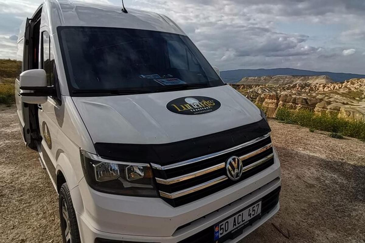 a white truck is parked in the desert