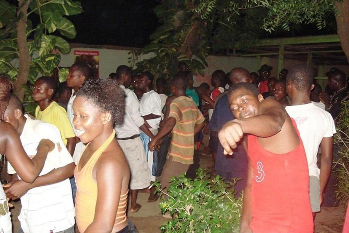 a large group of people standing in a crowd