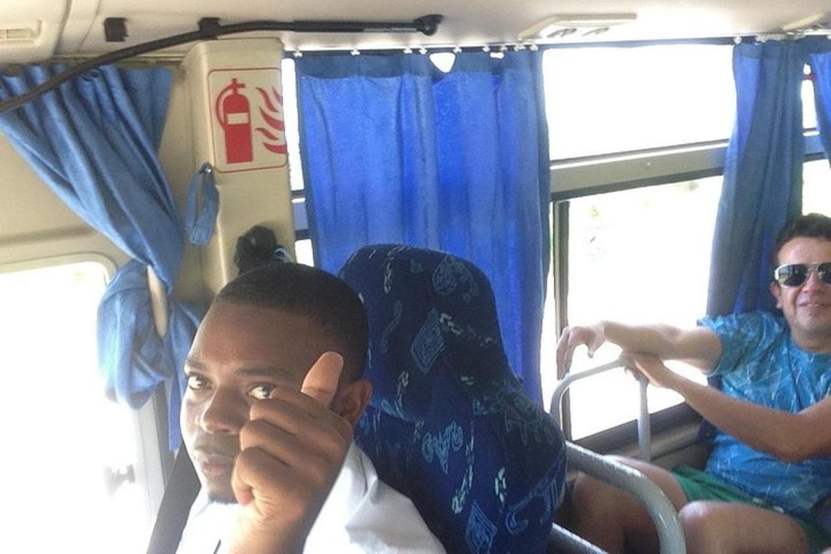 a young boy is sitting on a bus