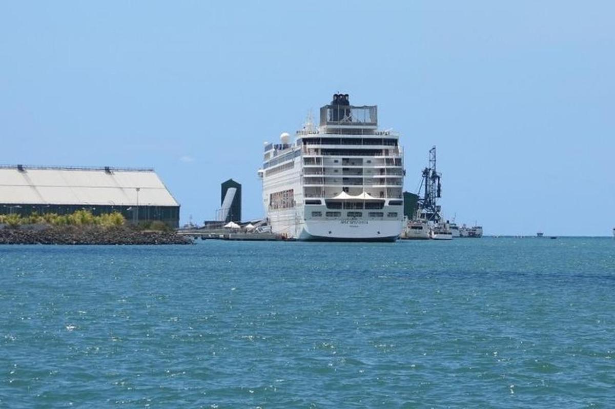 a cruise ship is docked in the water