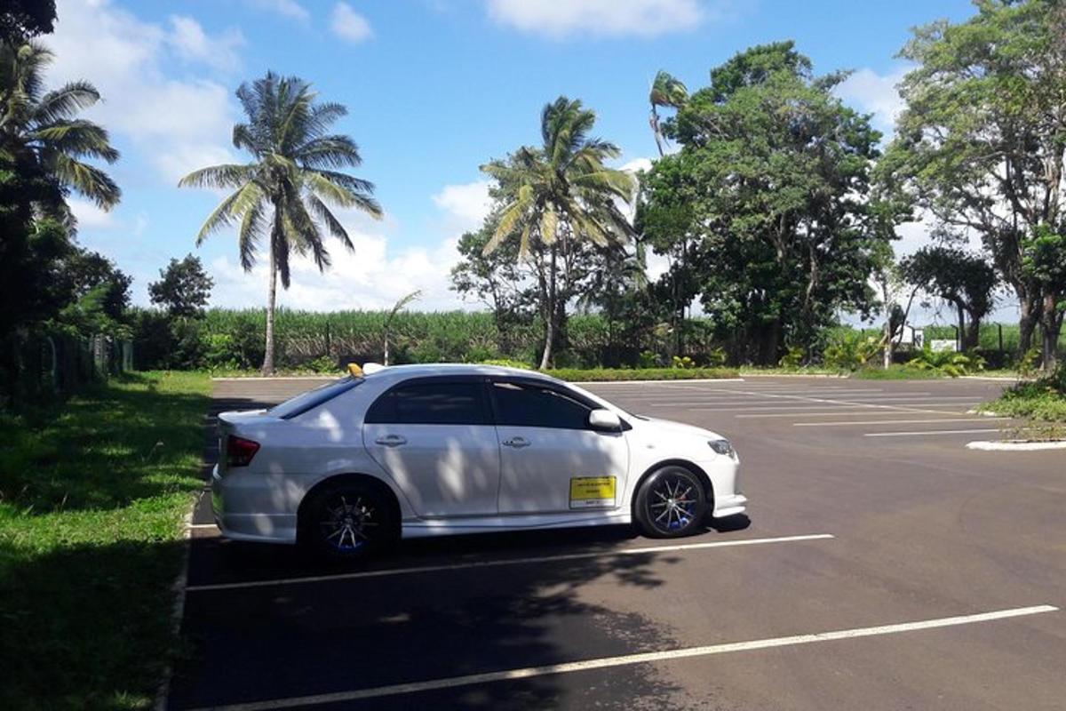 a white car parked in a parking lot