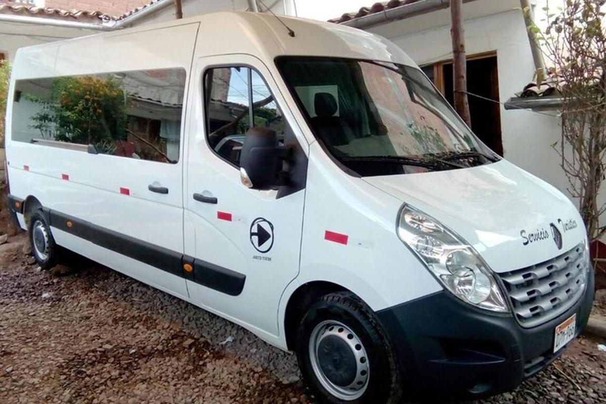 a white van parked in front of a house
