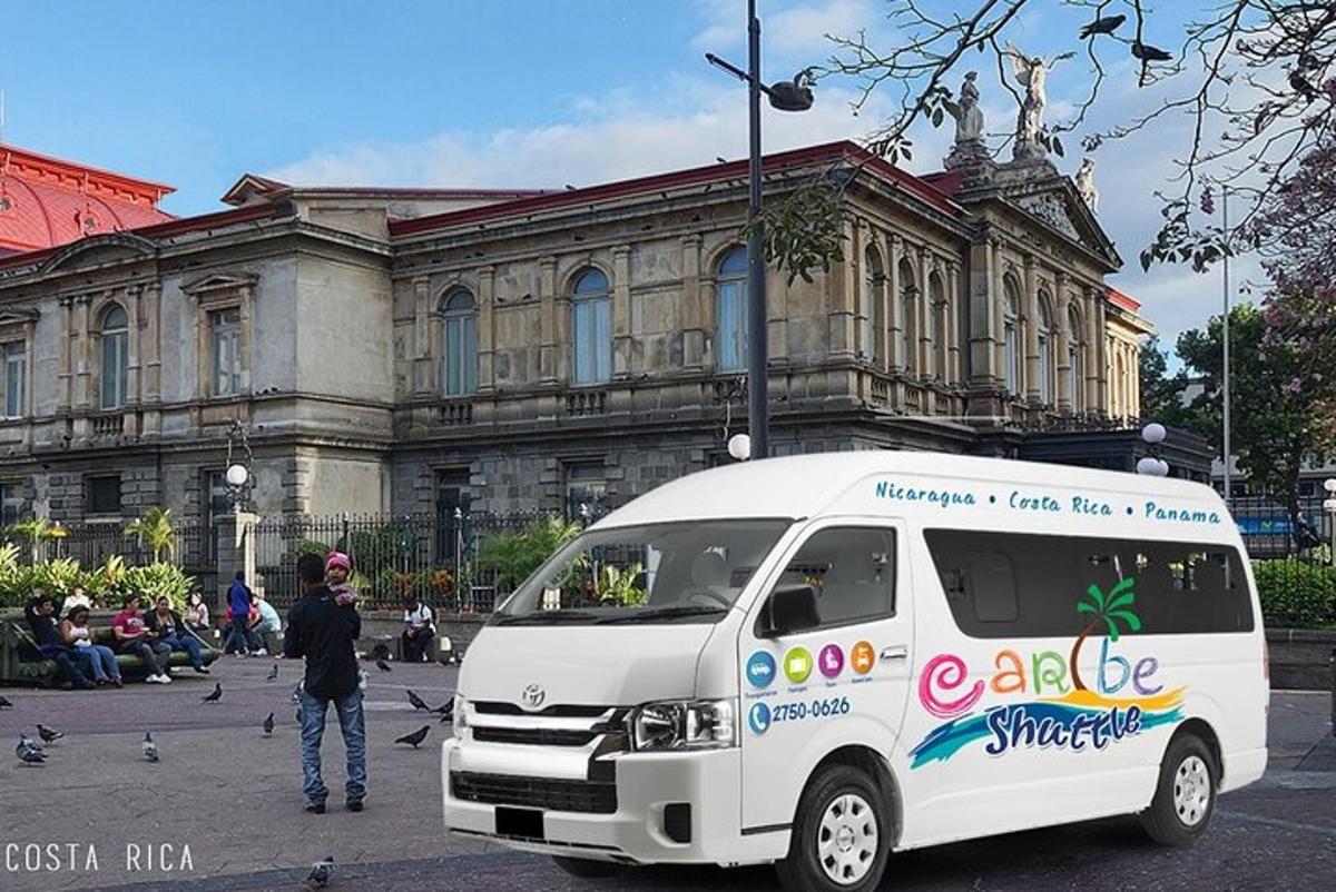 a white van parked in front of a building