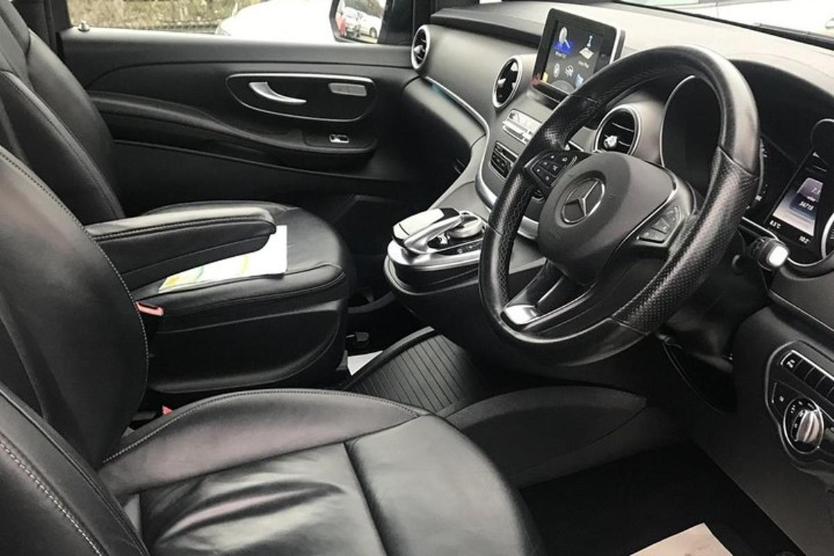 a close up of the steering wheel of a car
