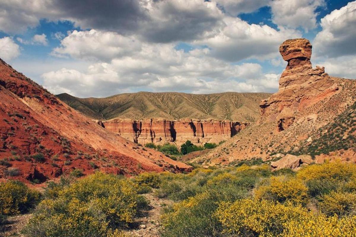 a view of a canyon with a rock formation