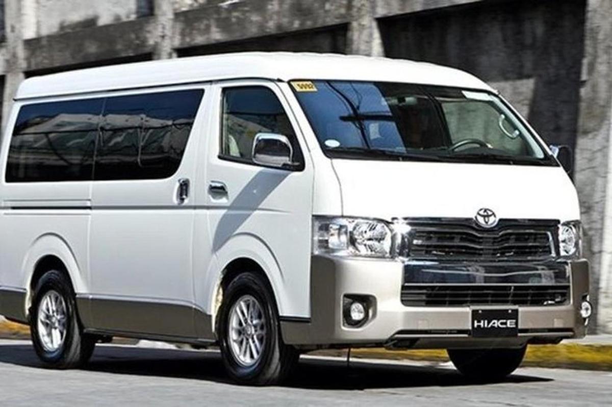 a white van is parked on a street