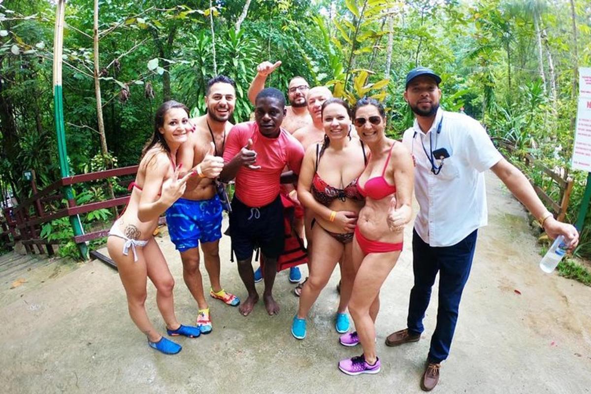 a group of men and women posing for a picture