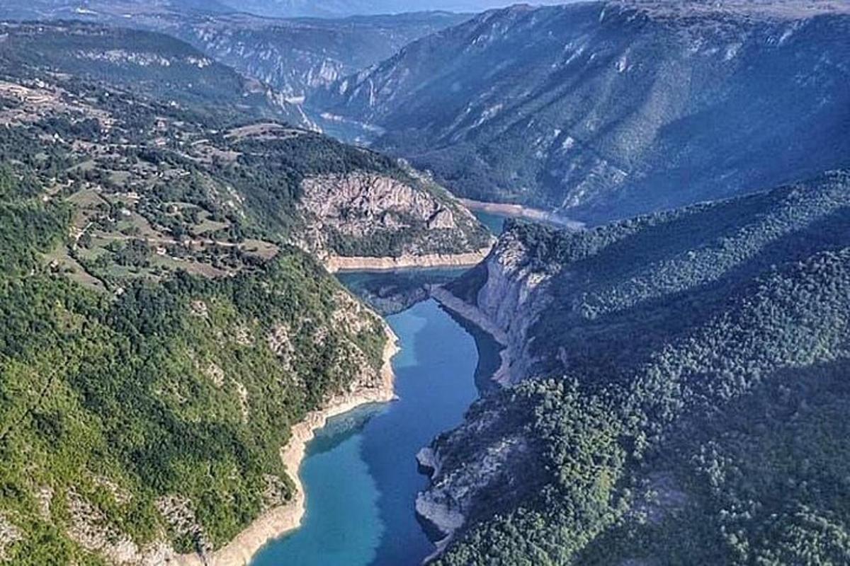 an aerial view of a river in a canyon