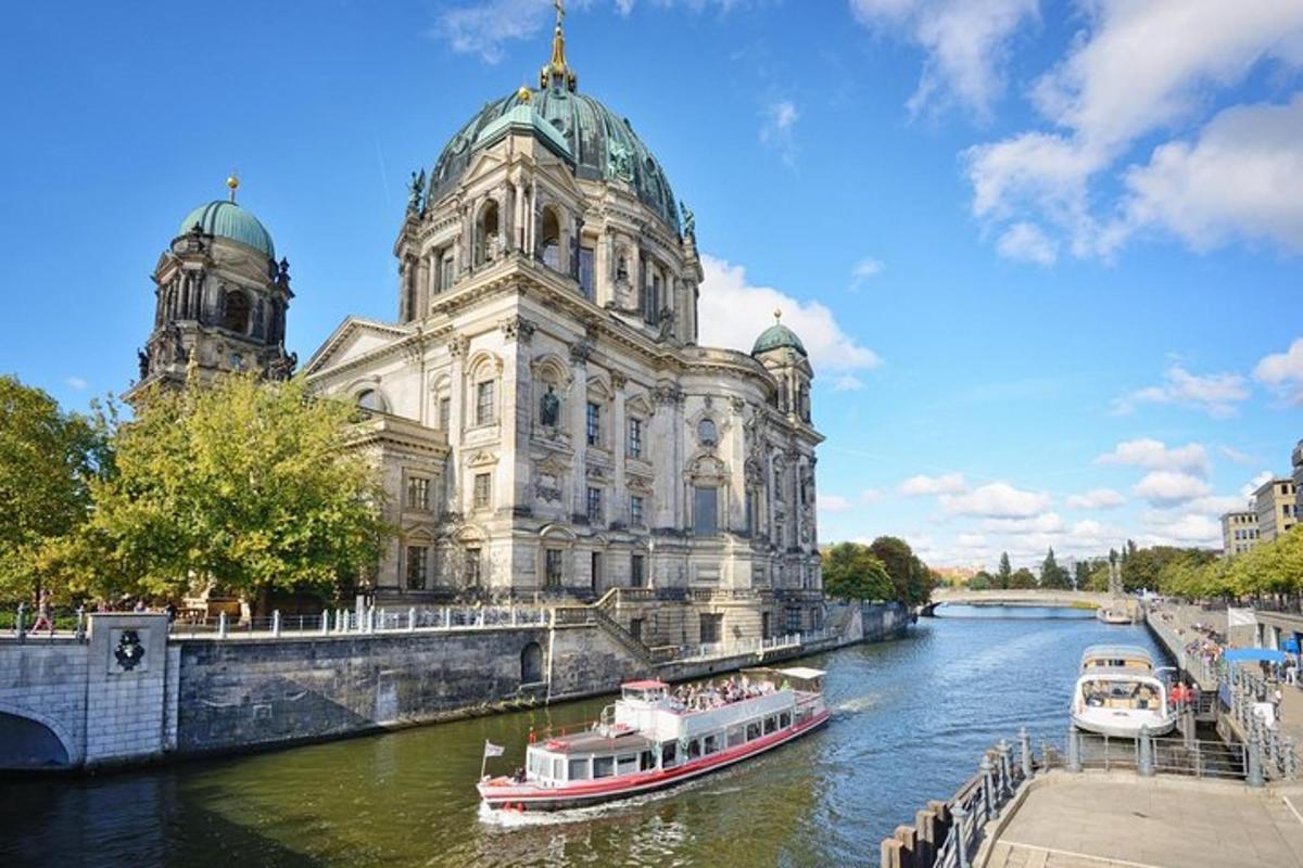 two boats in a river in front of a building