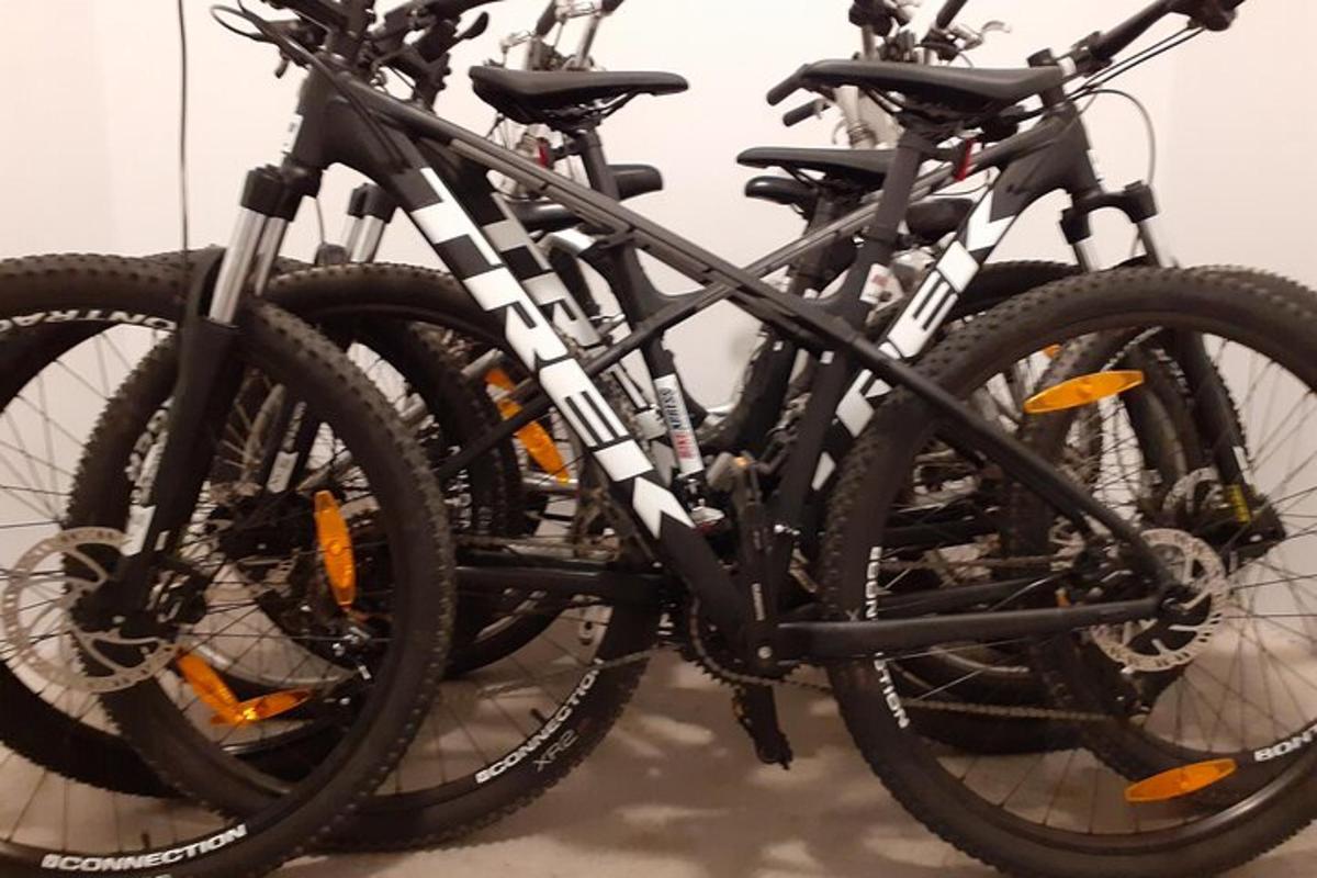 two bikes are parked next to each other