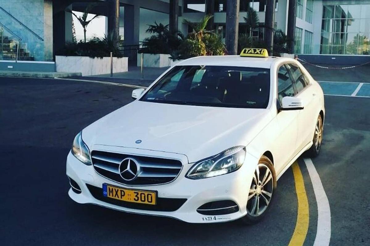 a white car parked in a parking lot