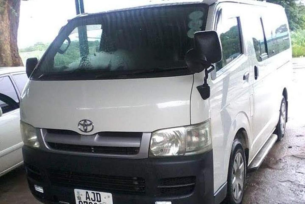 a white van parked in a parking lot